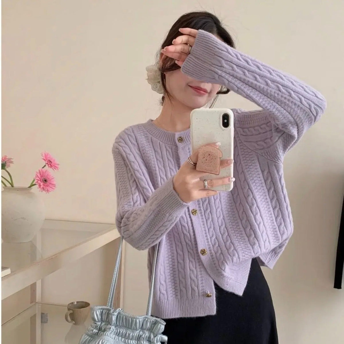 Cardigan a trecce dalla linea ampia