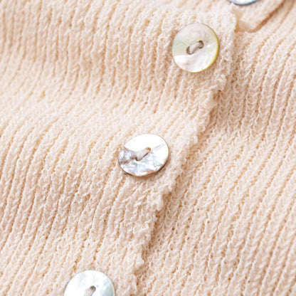 Gilet beige in maglia a coste con piccoli bottoni