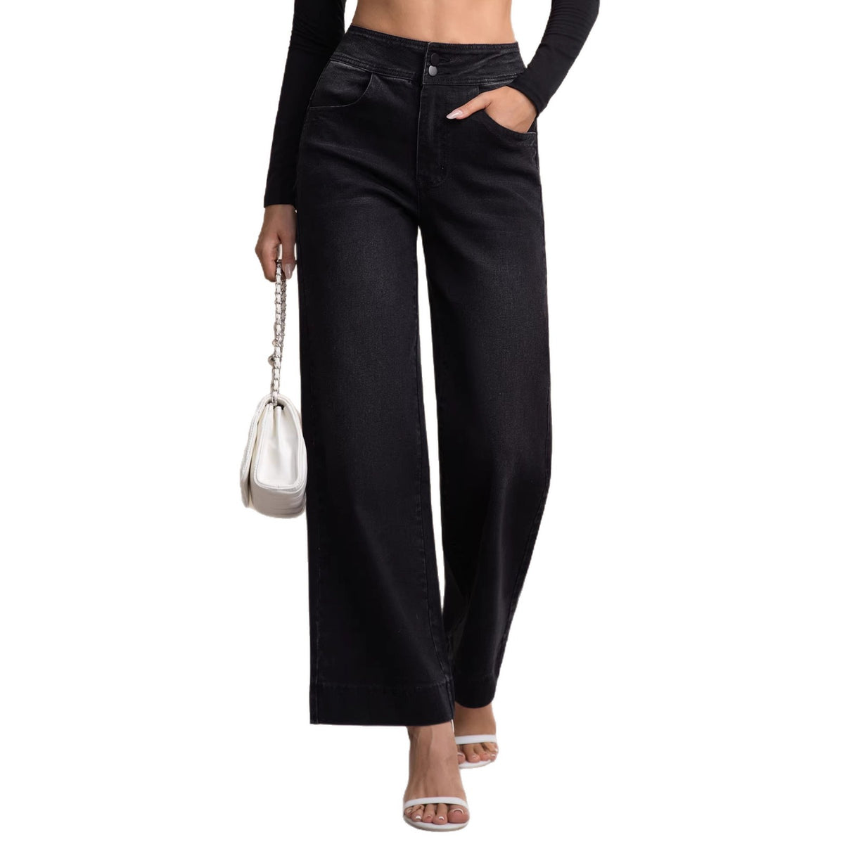 Jeans neri a vita alta con tasche