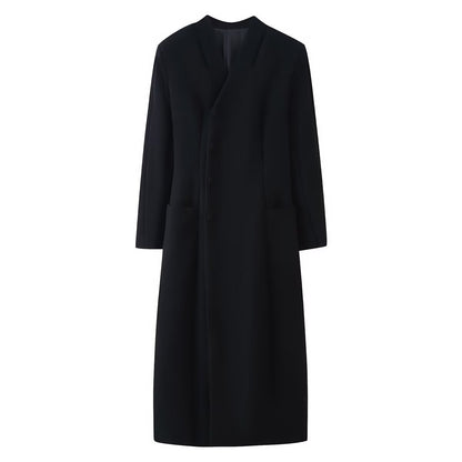 Cappotto lungo doppiopetto con revers e tasche