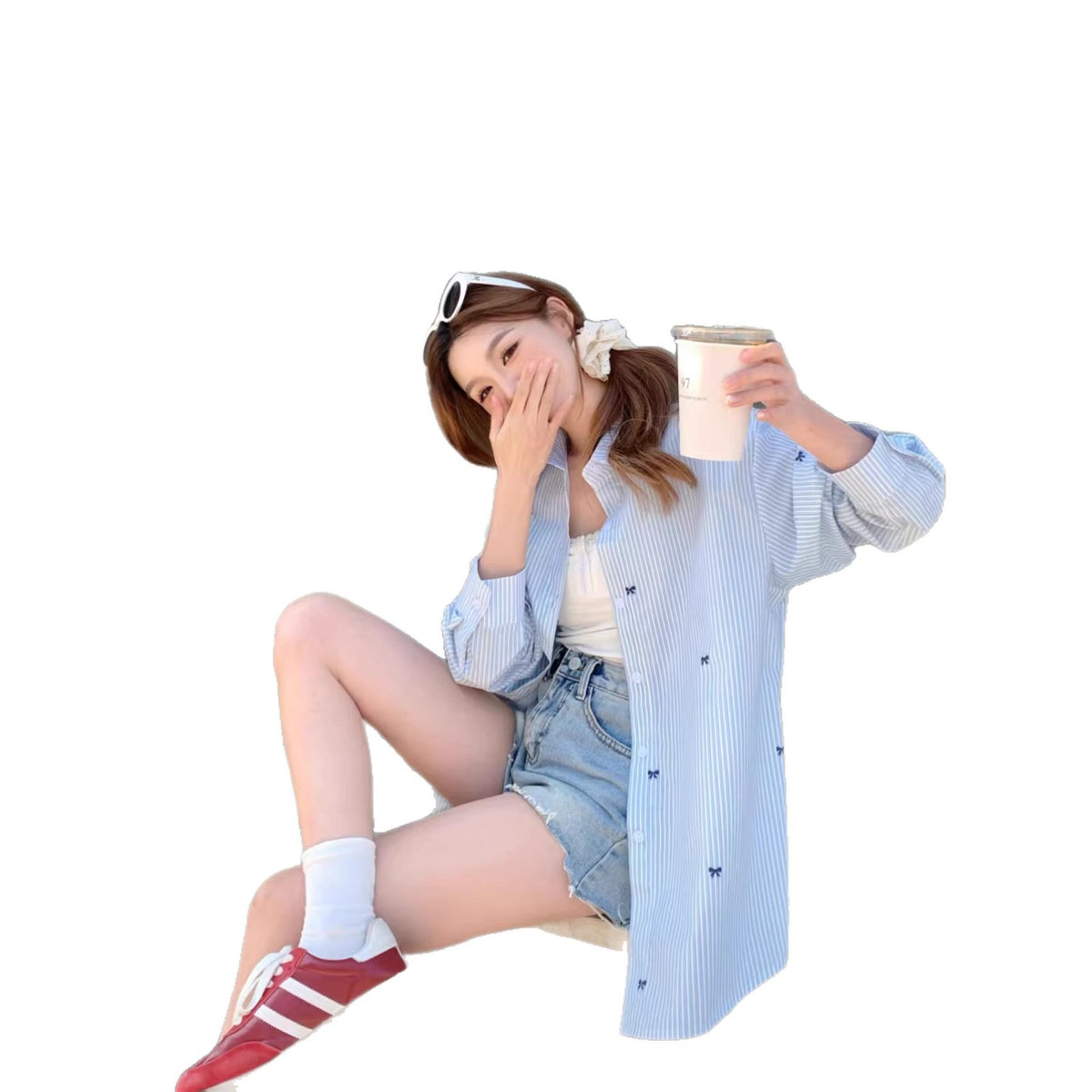Camicia a righe azzurre con piccoli fiocchi