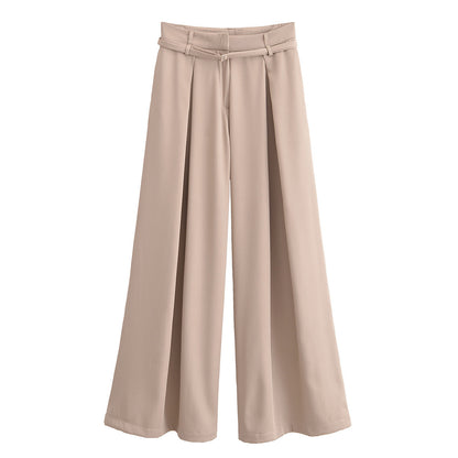 Pantaloni beige con cintura sottile e pieghe