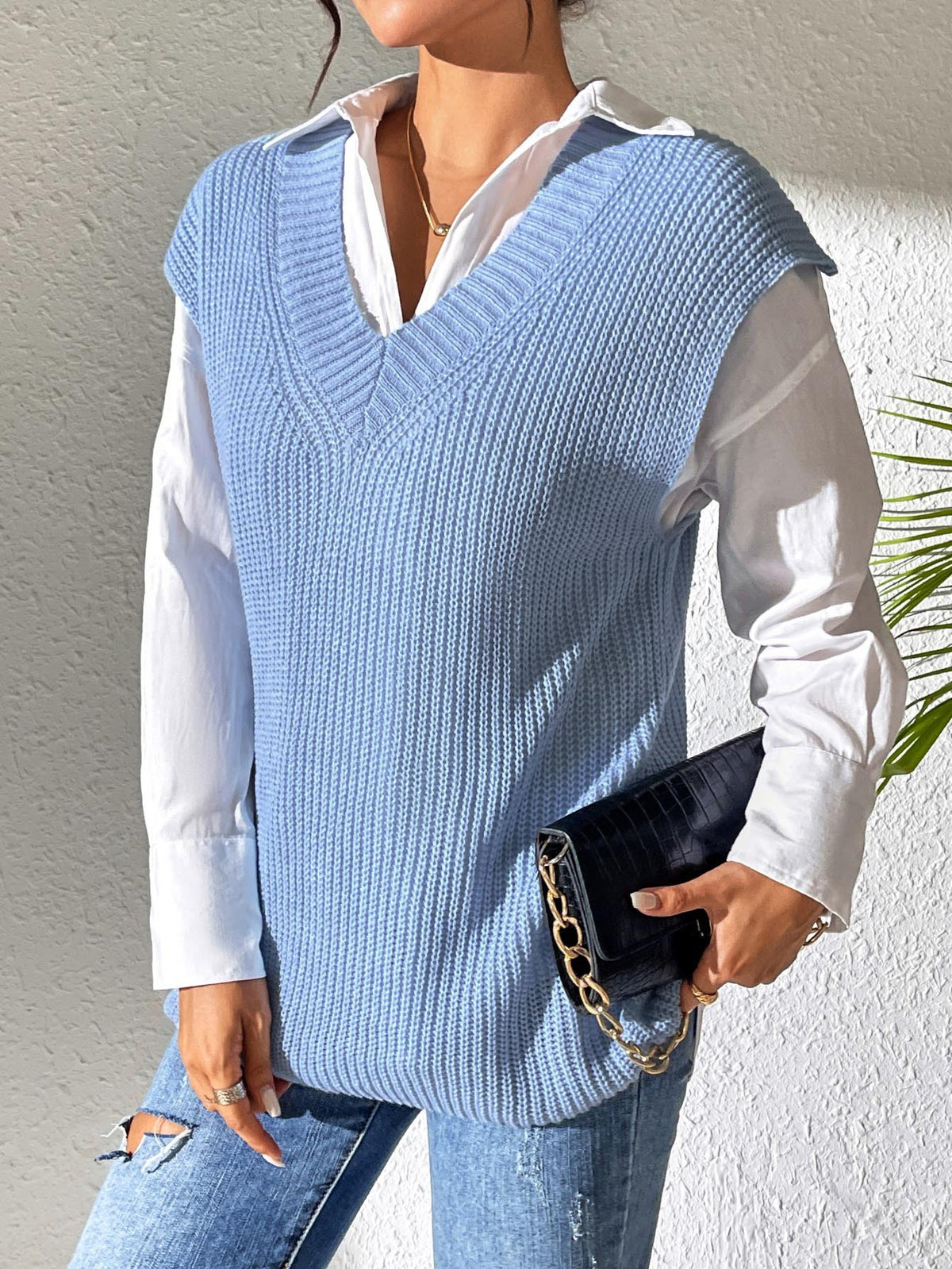 Gilet in maglia con scollo a V e spacchi