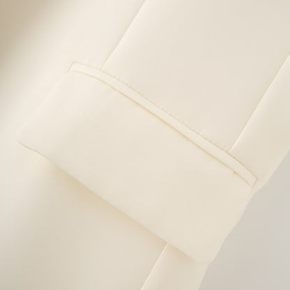 Gilet avorio lungo con bottone e tasche
