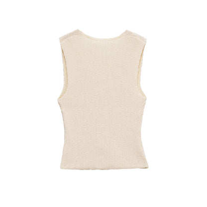 Gilet beige in maglia a coste con piccoli bottoni