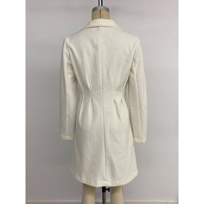 Cappotto beige doppiopetto con revers