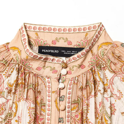 Blusa stampata con pieghe e maniche ampie