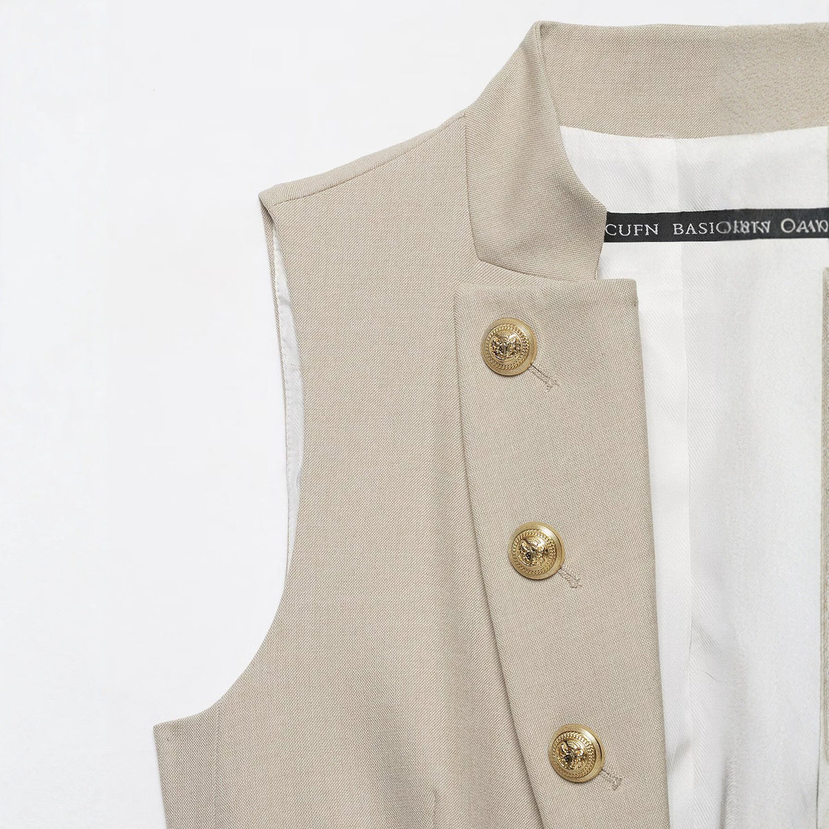 Gilet beige con bottoni dorati - foto 2