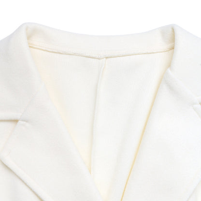 Cappotto beige doppiopetto con revers