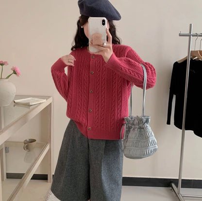Cardigan a trecce dalla linea ampia