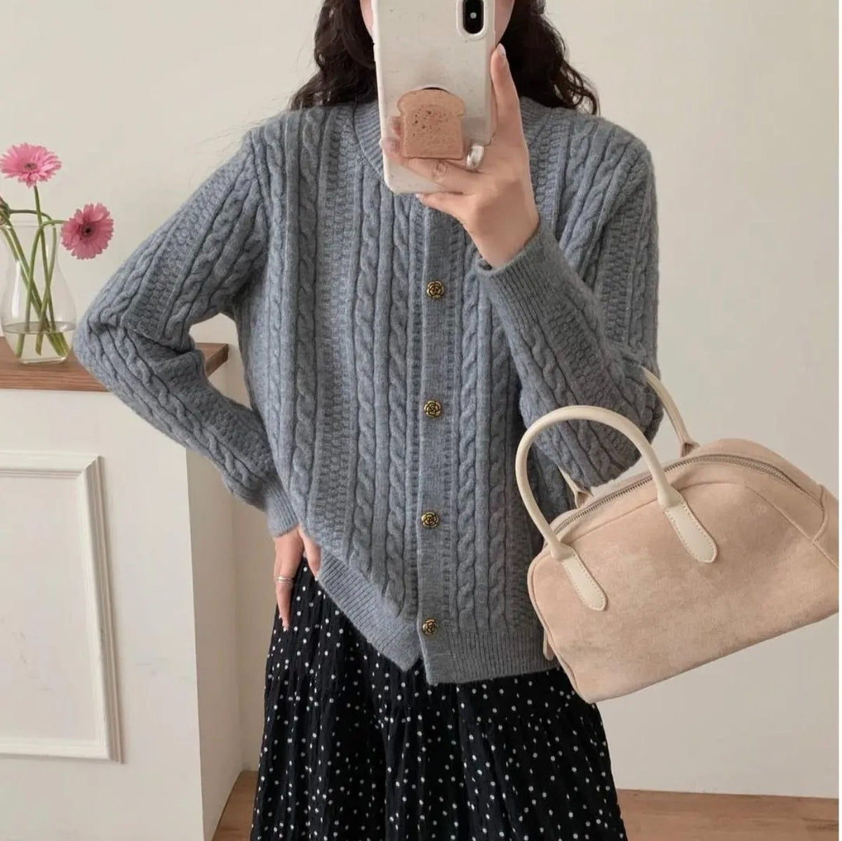 Cardigan a trecce dalla linea ampia