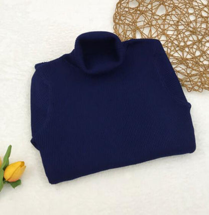 Abito aderente in maglia a collo alto