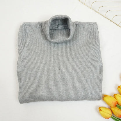 Abito aderente in maglia a collo alto
