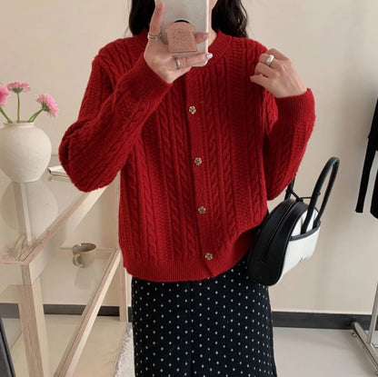 Cardigan a trecce dalla linea ampia